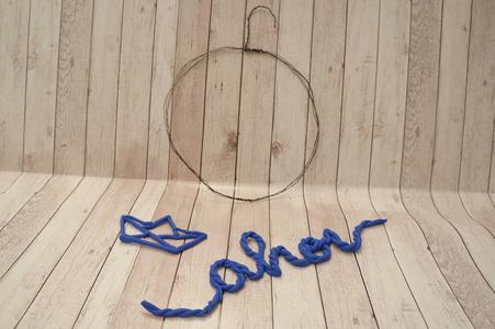 T&uuml;rkranz selber machen: Fimo verbinden mit Kranz