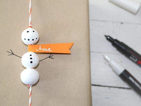 Geschenkverpackung mit Schneem&auml;nnern zu Weihnachten zum Selberbasteln